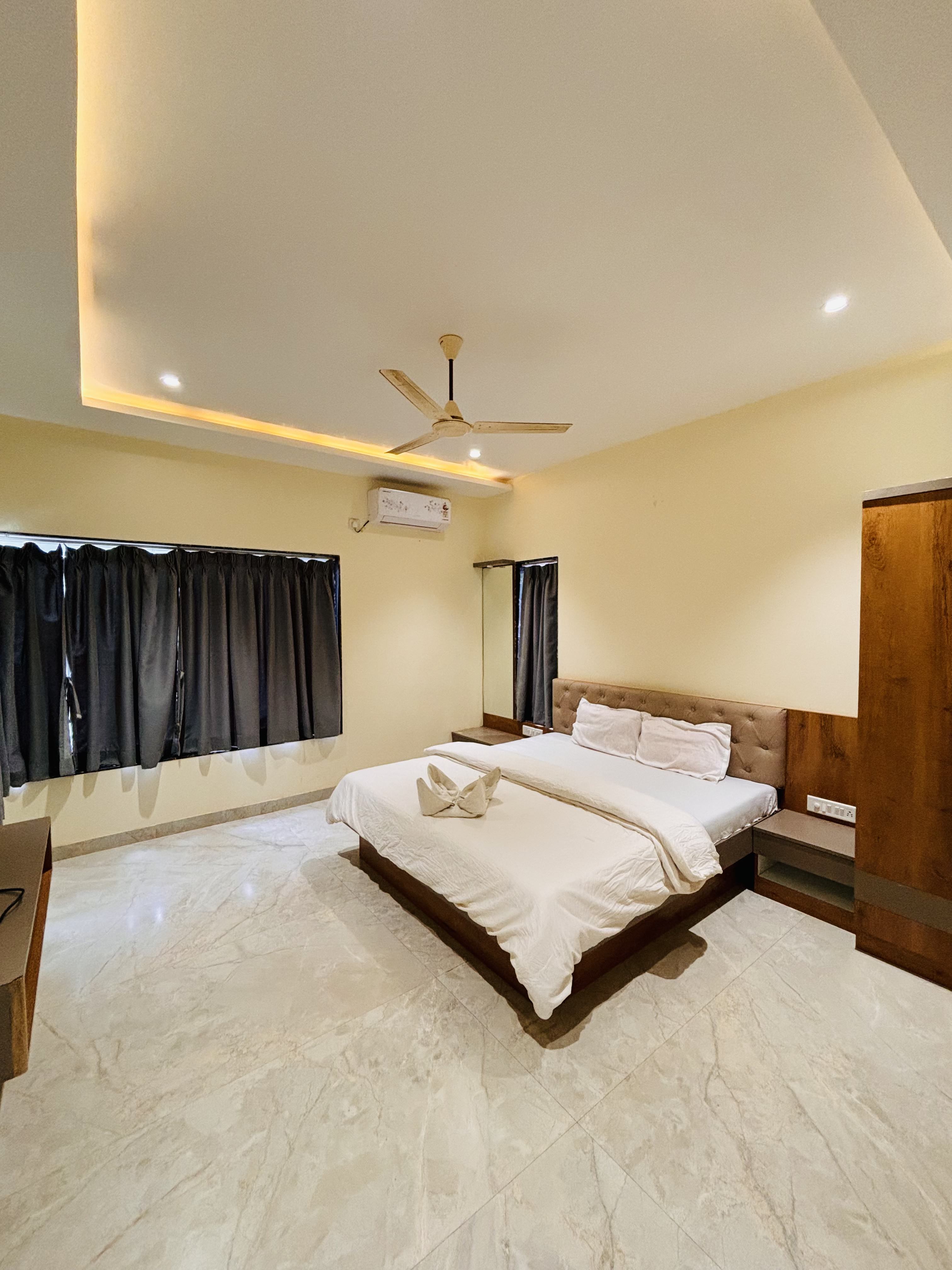 AC bedroom at Paramount's Vinayaka Homestay