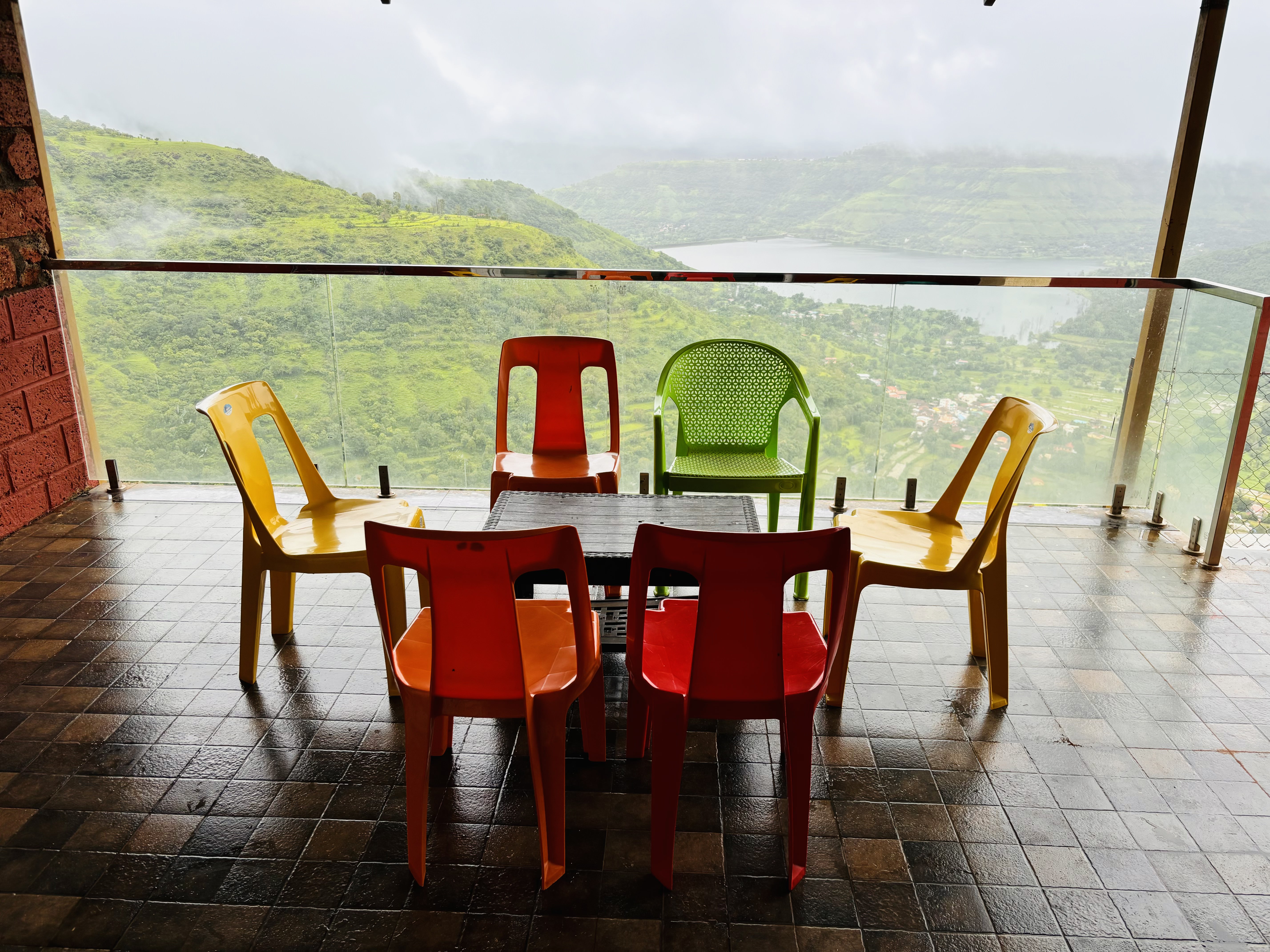 Covered terrace with dam view at Paramount's Vinayaka Homestay